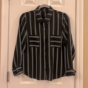 Black and Ivory button down blouse. Two front pockets. Gently worn.